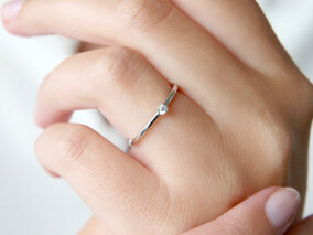 Verlobungsring Pure in 14K Roségold mit Diamant 0,04ct G/SI