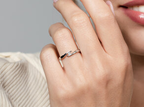 Verlobungsring Twist in Silber 925/- mit Diamant 0,07ct D/IF