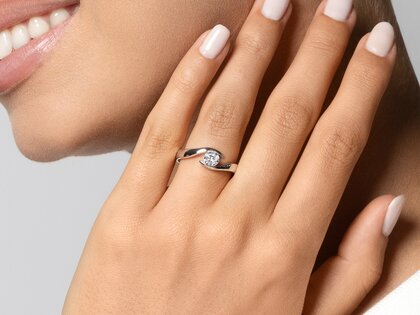 Verlobungsring Twist in 18K Roségold mit Diamant 0,40ct G/SI